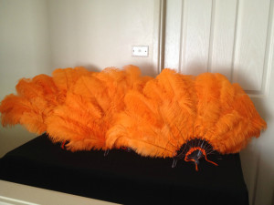 Bright orange feather fans made for the Sydney Theatre Company